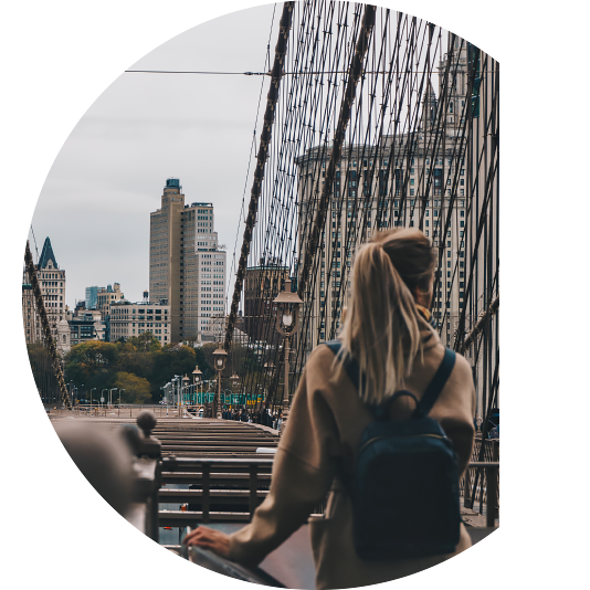 Girl using mobile audio tour in city